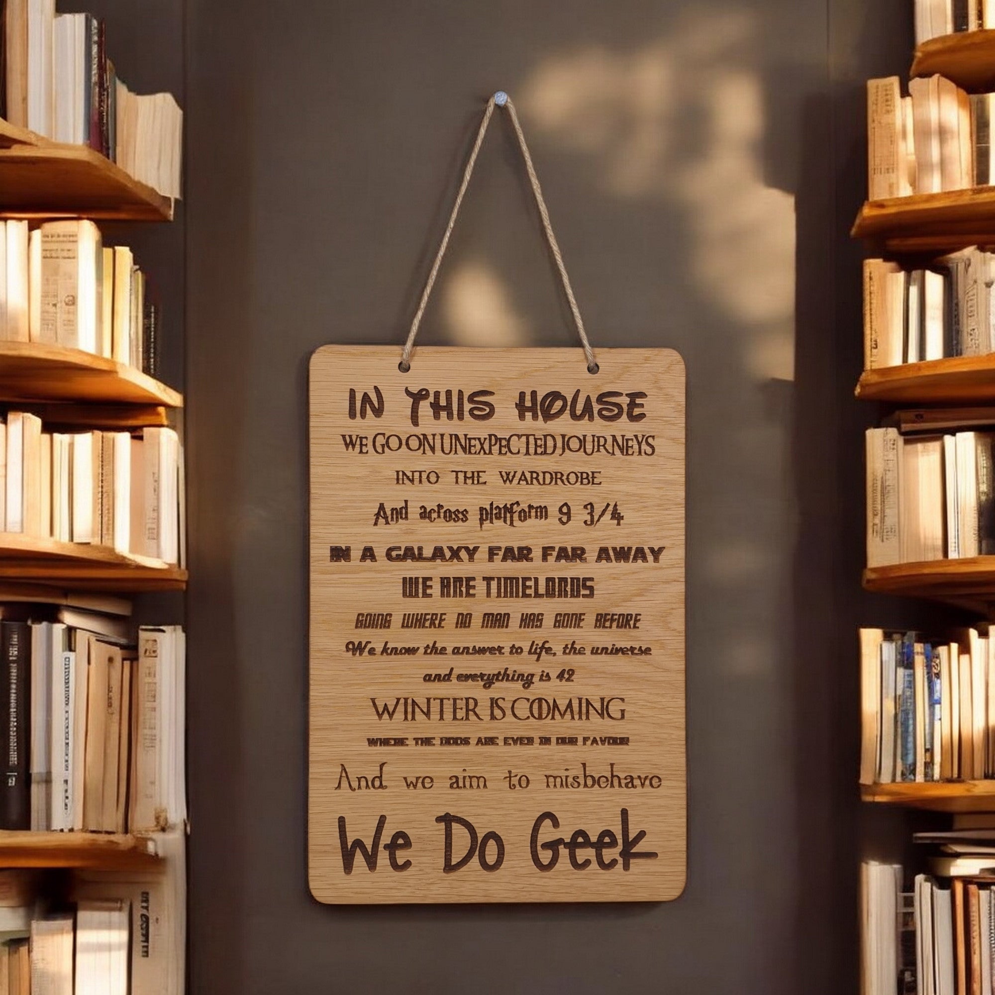In This House We Do Geek wooden hanging sign.