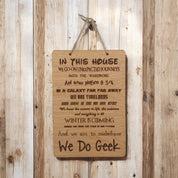 In This House We Do Geek wooden hanging sign.